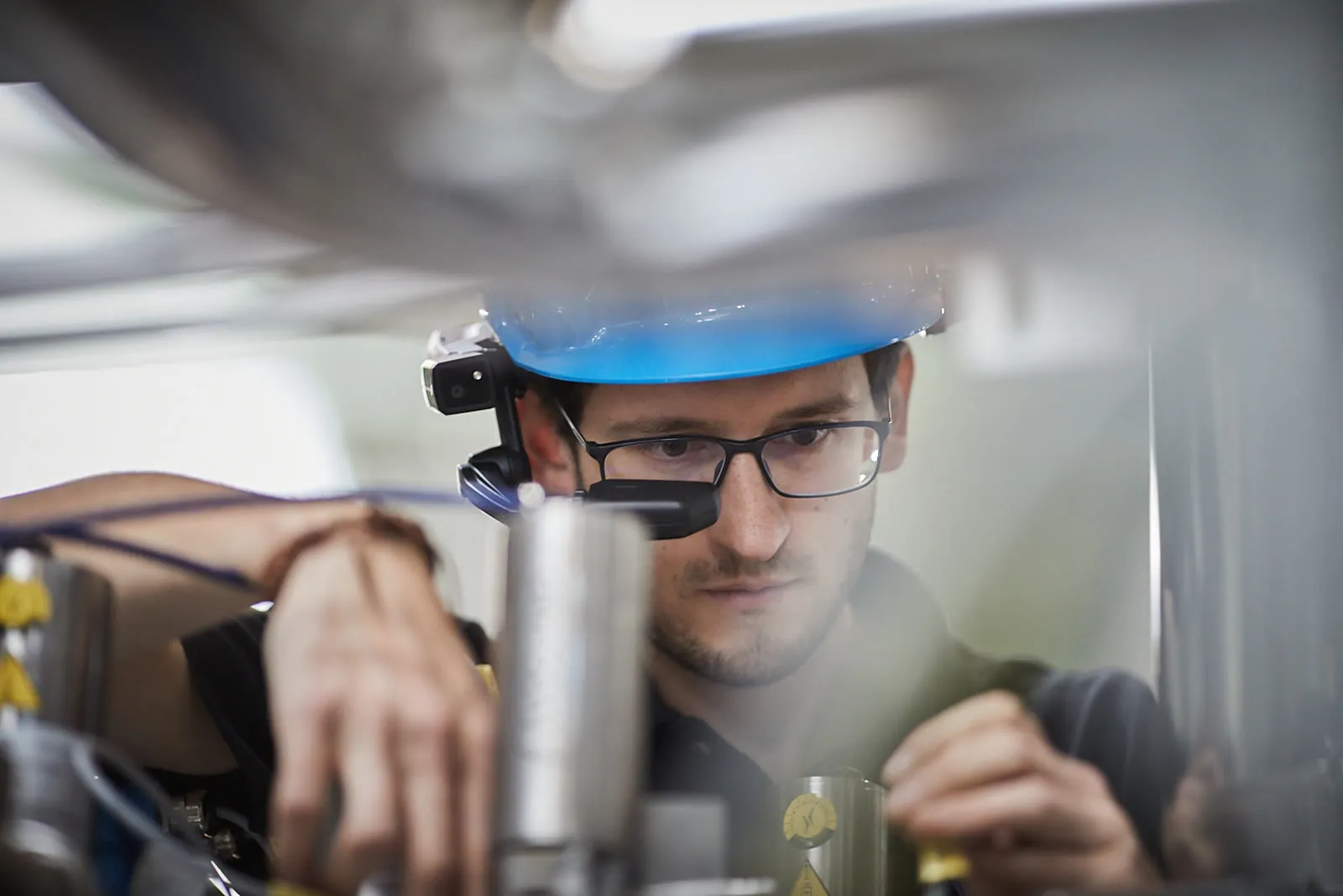 Close-up of a worker using a RealWear device